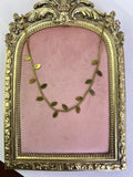 Gold Trailing Leaf Charm Necklace